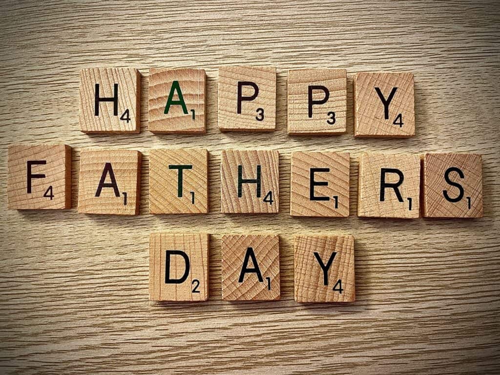 Happy Father's Day spelled out in Scrabble tiles. 